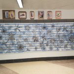 Grover Washington Jr. Middle School first floor hallway art work created by students in collaboration with artist Ben Volta.