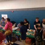 Teacher's, and Families gathered together on Back to school night, for our Barbecue. It is located inside the lunchroom because it rained.